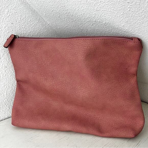Free People Handbags - Free People pink faux leather large clutch lined zip closure